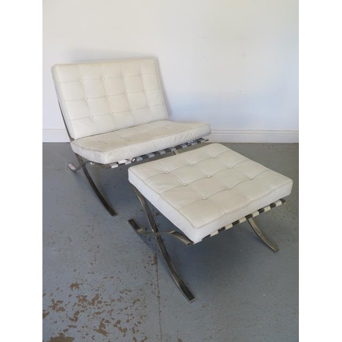 20 - A Barcelona style chair with footstool in white leather, good condition, some signs of wear