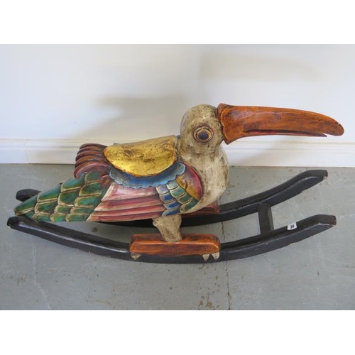 28 - A decorative bird child's rocker, 65cm tall x 105cm