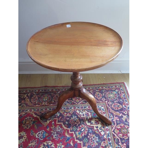 3 - A Georgian style elm tripod side table with a 43cm diameter top, 54cm tall