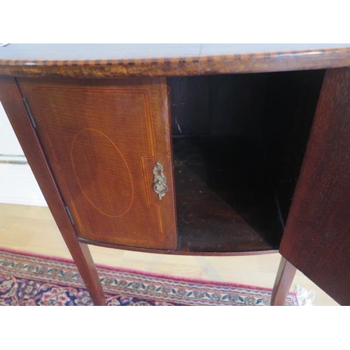 63 - An Edwardian inlaid mahogany dropleaf work table / cabinet on splayed legs, 71cm tall x 91xm extende... 