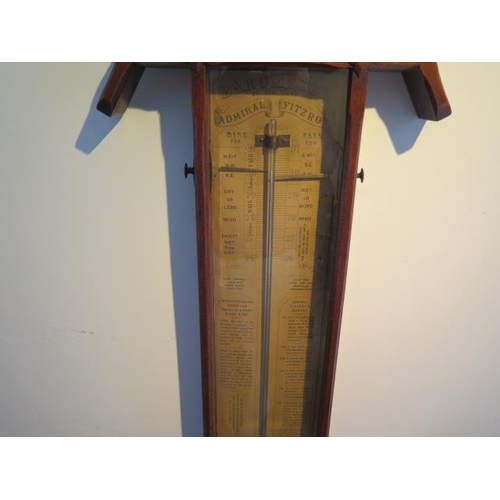 153 - An oak Admiral Fitzroy barometer with clock thermometer, 130cm tall, clock not currently running, so... 