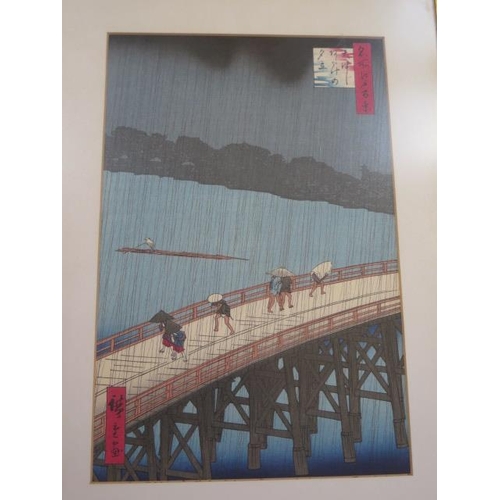 242 - A pair of Japanese coloured prints Kameido Temple Toyko and sudden shower at Chashi after Hiroshige,... 