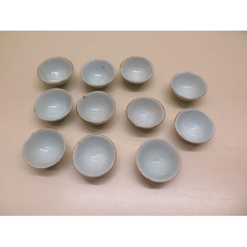 311 - Eleven blue glaze ceramic saki cups, 4.5cm diameter