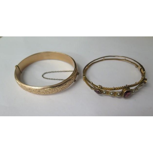 477 - Two 9ct yellow gold hinged bangles, 6.5cm x 5.5cm external, total weight approx 20.9 grams, clasps g... 