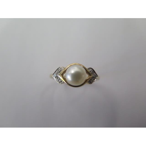 482 - A hallmarked 9ct yellow gold pearl and diamond ring, size O, approx 2.2 grams, good condition