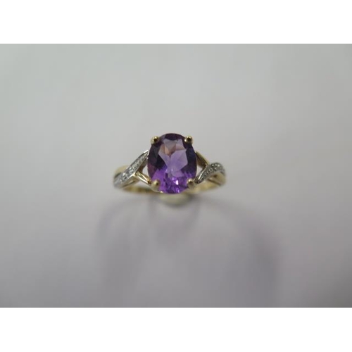 483 - A hallmarked 9ct yellow gold amethyst and diamond ring, size O, approx 2.5 grams, good condition