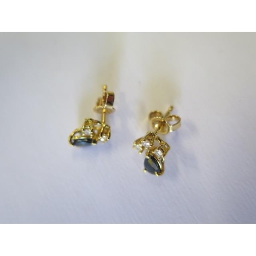 485 - A pair of sapphire and diamond earrings - each designed as a pear shaped sapphire to the brilliant c... 
