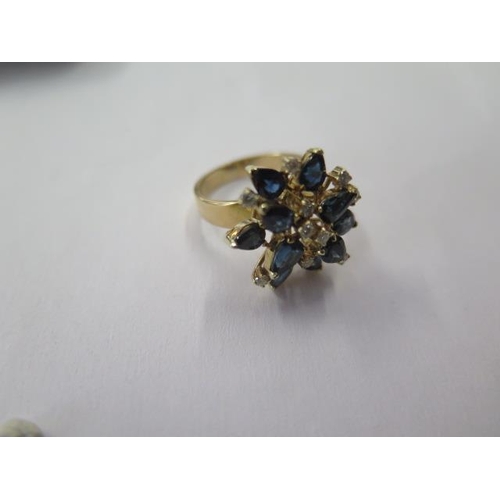 488 - A 14ct yellow gold sapphire and diamond cluster ring, size M/N, head approx 20mm wide, approx 6.4 gr... 