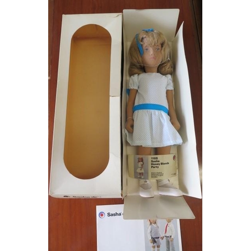 756 - A Sasha honey blond party doll 1165, boxed, 42cm tall, in good condition, some wear to box