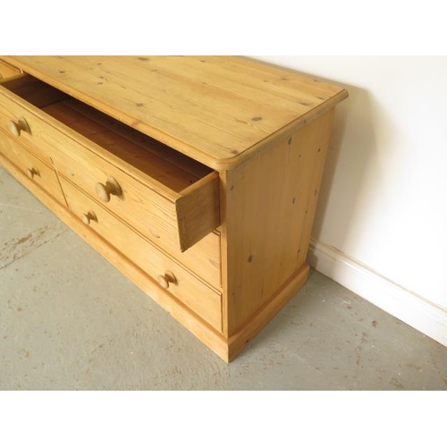 12 - A pine 6 drawer long chest, 69cm tall x 173cm x 44cm, in good condition