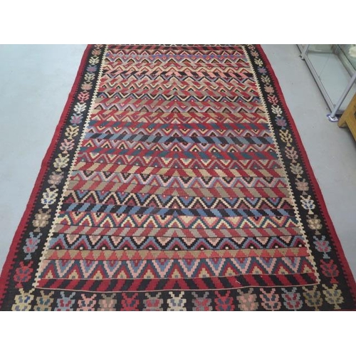 221 - A Kilim rug approx 2m x 3.5m used but reasonably good
