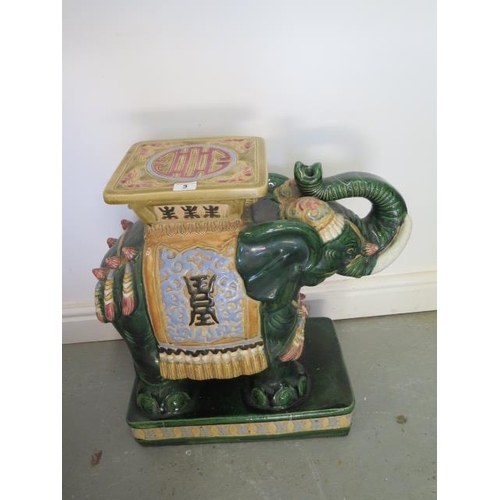 3 - A Chinese ceramic Elephant garden stool, 55cm tall x 55cm long, minor chips to base otherwise genera... 