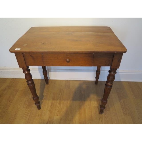 53 - A Victorian single drawer side table on turned legs, 74cm tall x 79cm x 53cm