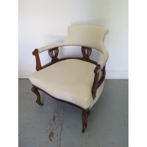 61 - An Edwardian beechwood upholstered open armchair in good condition, 74cm tall x 64cm wide x 61cm dee... 