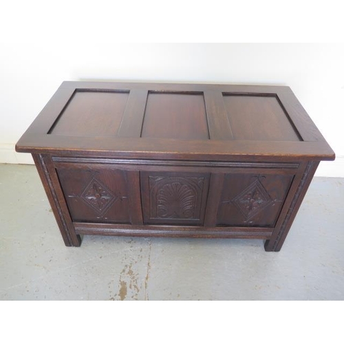 66 - An early 20th century oak 3 panel coffer with carved front, in polished condition, 76cm tall x 91cm ... 