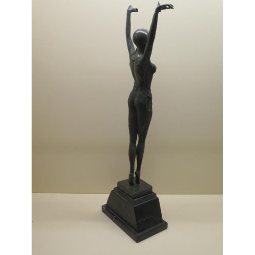 281 - An Art Deco style dancer figure on a black marble base in good condition, 64cm tall
