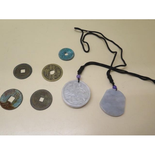 294 - Two Chinese glass pendants and 5 metal tokens