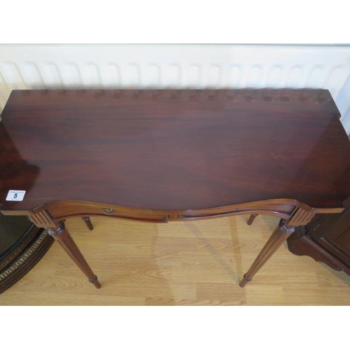 5 - A modern mahogany 2 drawer hall table on reeded legs, 74cm tall x 80cm x 34cm