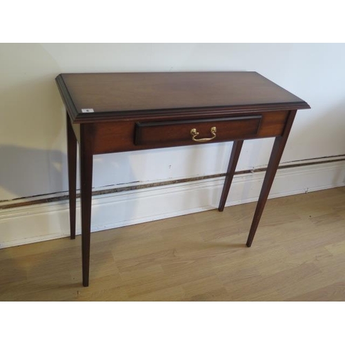 6 - A modern mahogany side table with a drawer, 73cm tall x 84cm x 34cm