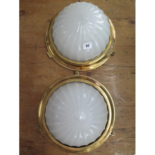 60 - A pair of brass and glass half dome ceiling lamps, 31cm wide x 17cm tall