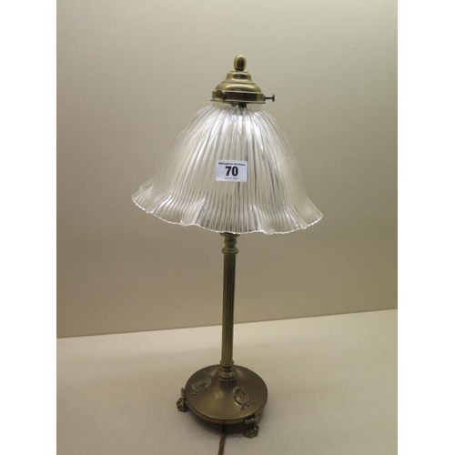 70 - A brass table lamp with a holophane type glass shade, working, 47cm tall
