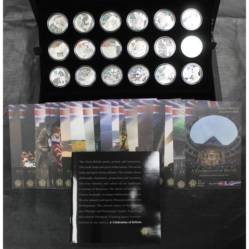The Royal Mint Celebration of Britain 18-coin silver proof £5 set created for the London 2012 Olympics. Housed in an impressive display case (with a little wear and tear) this set celebrates people, landmarks, traditions, nature, the arts and many more in stunning fashion. All coins as struck; a real collectors gem complete with booklet & COA's.