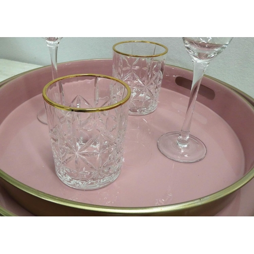 98 - DRINKS SET, including two trays, 40cm diam. at largest, two champagne flutes, 24cm H, and two tumble... 