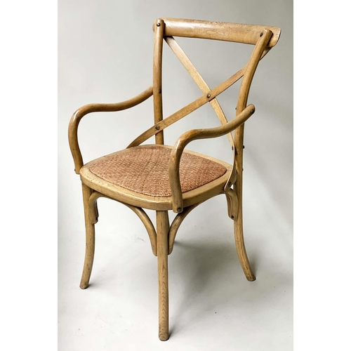 27 - OKA DINING CHAIRS, a set of six oak bentwood with bentwood frame and backs and cane seats. (6)