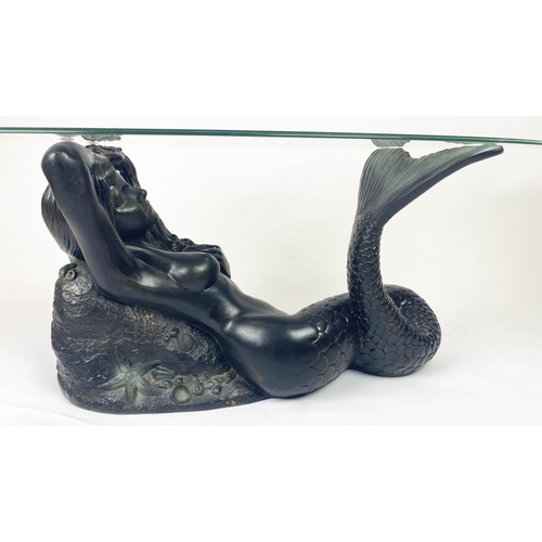 8 - LOW TABLE, 121cm L x 60cm W x 50cm H, of bronze 'Mermaid' base and oval rimed glass top.