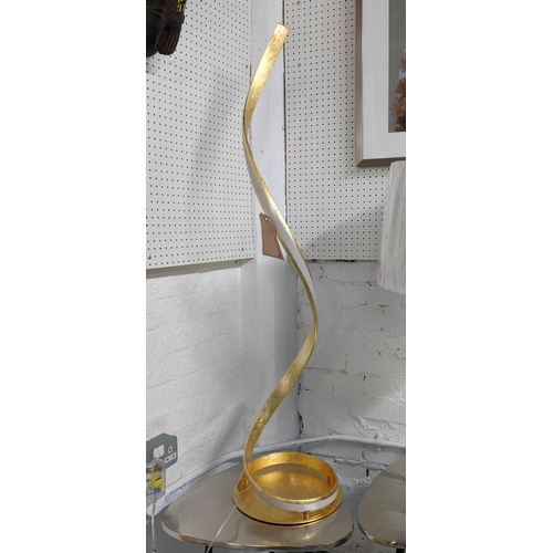 111 - FLOOR LAMP, 123cm H helix design, gilt finish.