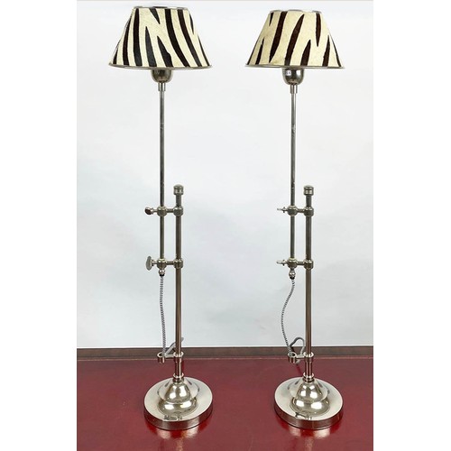 38 - TABLE LAMPS, a pair, telescopic chrome column with zebra pattern painted hide shades, fully extendab... 