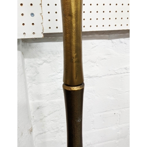 99 - FAUX BAMBOO FLOOR LAMPS, a pair, 150cm gilt metal  (2)