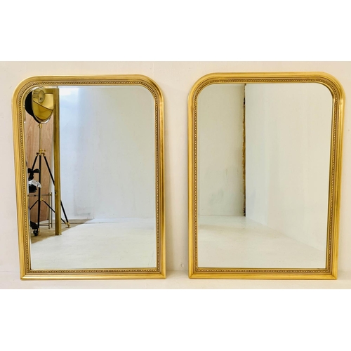 WALL MIRRORS, a pair, 110cm x 80cm, gilt frames. (2) Barnebys