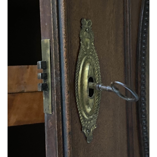 116 - DUTCH LINEN PRESS, 19th century Dutch figured mahogany with trellis cornice, interior shelves, five ... 