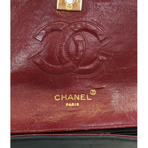 48 - VINTAGE CHANEL FLAP BAG, round turn-lock, iconic burgundy leather lining, quilted front and back dia... 