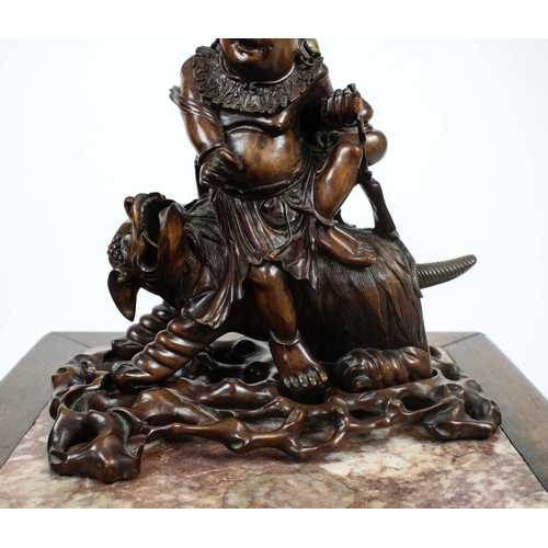 23 - MEIJI BOXWOOD CARVED FIGURE ON MYTHICAL BEAST, 25cm x 25cm H, carved base, and a Chinese carved side... 