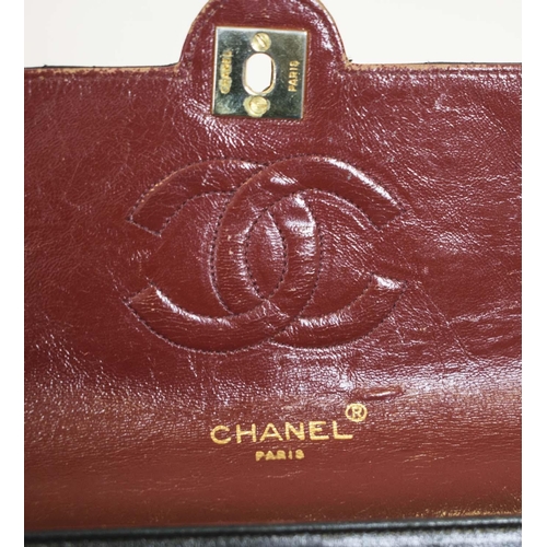 48 - VINTAGE CHANEL FLAP BAG, round turn-lock, iconic burgundy leather lining, quilted front and back dia... 