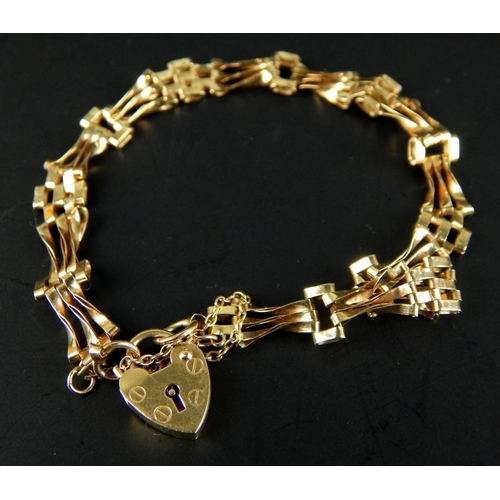 A 9ct gold gate bracelet, with three bar design and padlock, 4.4g.