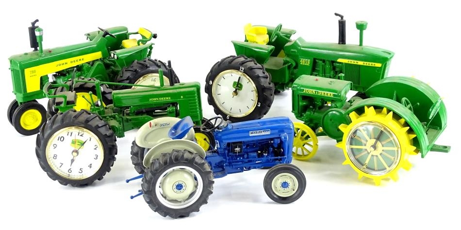 Four Danbury Mint novelty tractor clocks, each from the John Deere ...