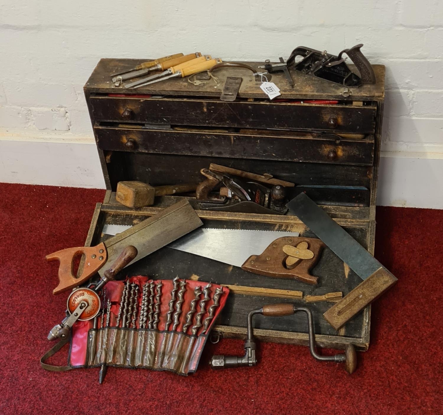 Lovely wooden carpenters tool box containing a large amount of tools