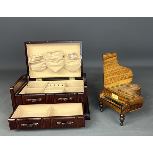 28 - 2 wooden jewellery boxes, one having fitted interior, the other being a musical type in the form of ... 