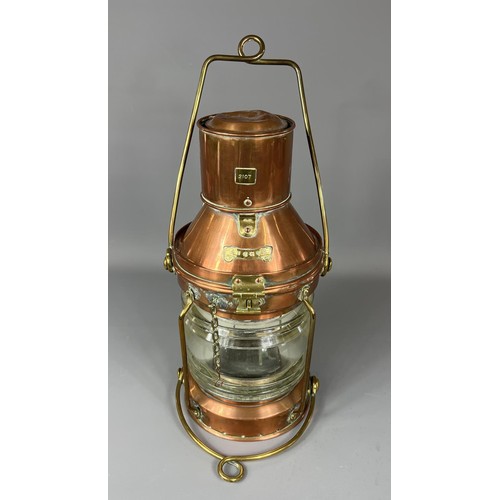 36 - Copper and brass ships lantern, 40cm in height. Shipping group (A).
