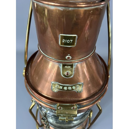 36 - Copper and brass ships lantern, 40cm in height. Shipping group (A).