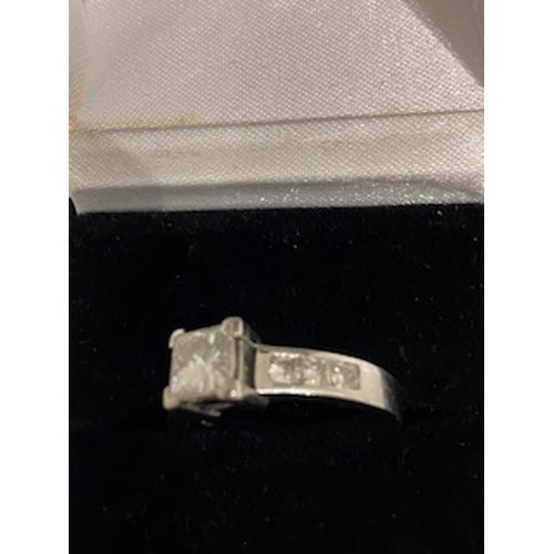 18 - 18ct White Gold Princess Cut 
0.75 carat central stone - 6 matching princess cut stone to either sid... 