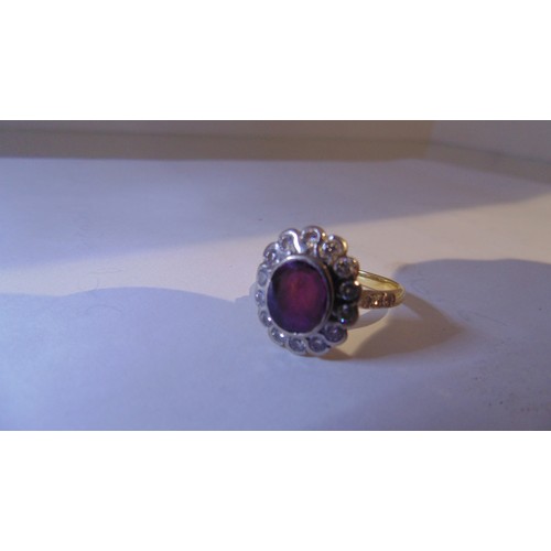 18ct Gold Ring with Diamonds and pink sapphire stone on a platinum mount
