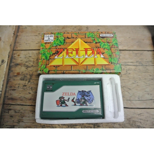 An Original Vintage Nintendo Game Watch Zelda Game Complete With Original Box
