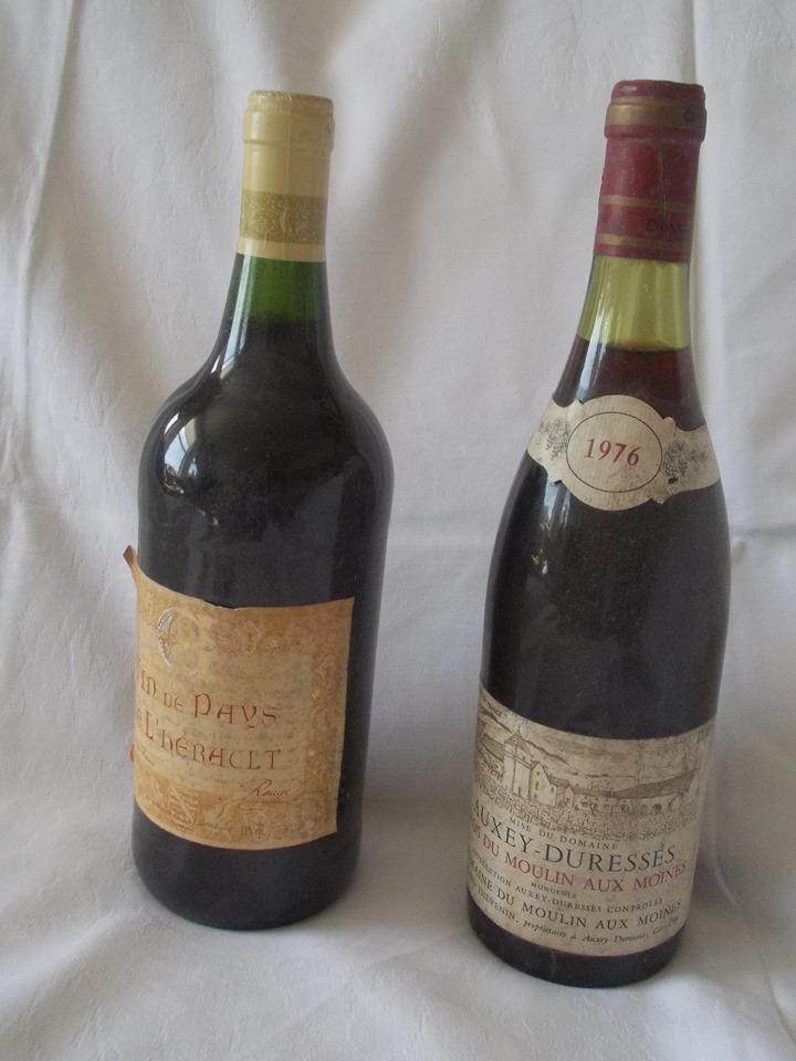 2-vintage-bottles-of-wine-both-sealed-and-unopened-levels-are-well-up