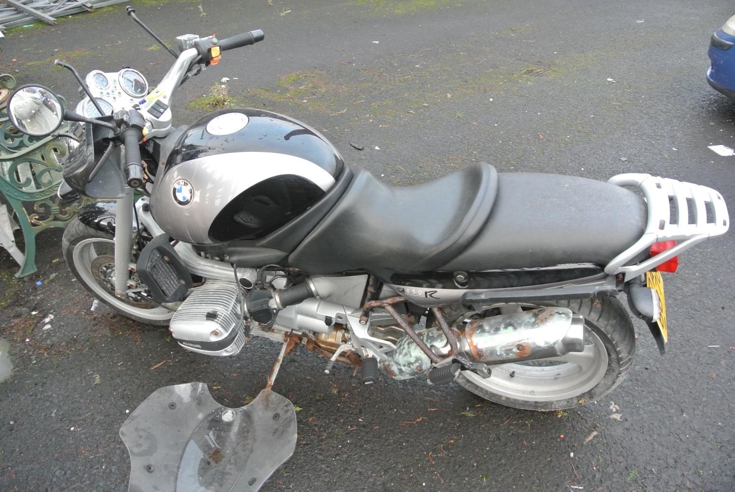 A BMW 800R motorcycle in need of some restoration, lacking V5.
