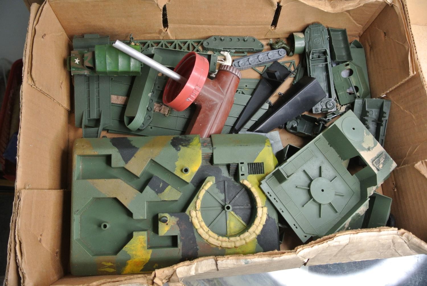 A collection of vintage military toys.