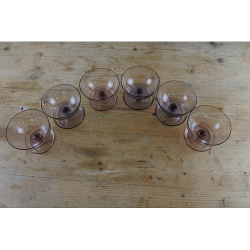 201 - A set of six vintage purple glass sundae dishes.